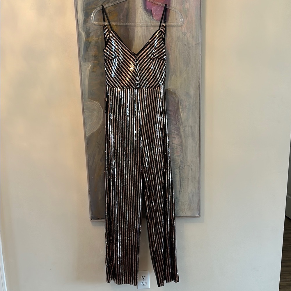 bebe Sequin Cowl Back Jumpsuit in Black & Gold